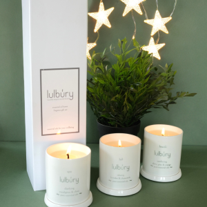 trio if white candles in white gift box